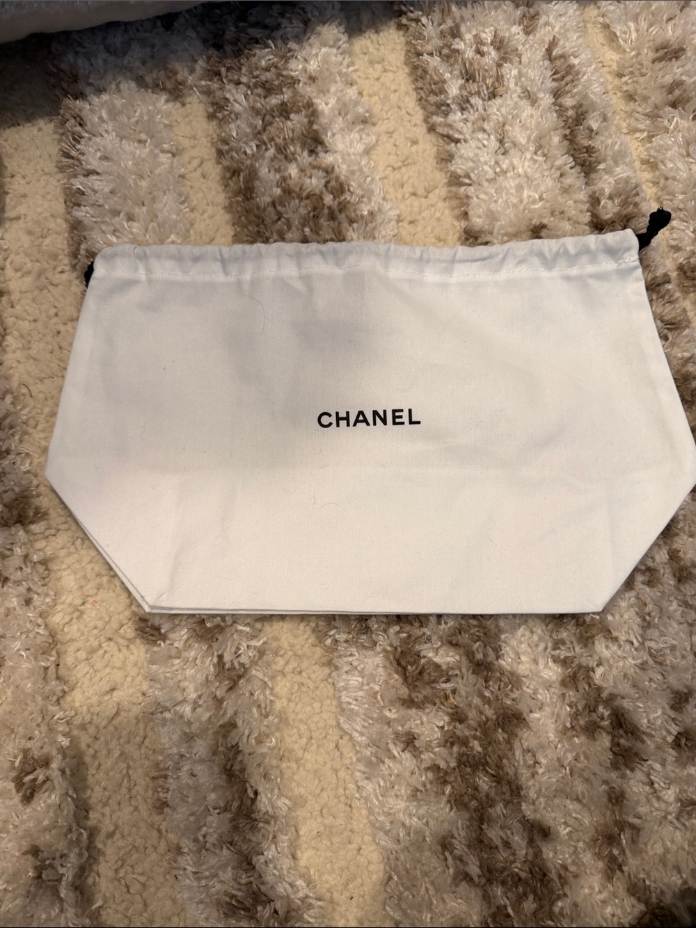 CHANEL White Drawstring Pouch with Black Logo